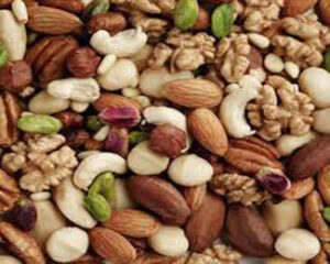 A healthy assortment of mixed dry fruits and nuts including almonds, cashews, walnuts, and pistachios.